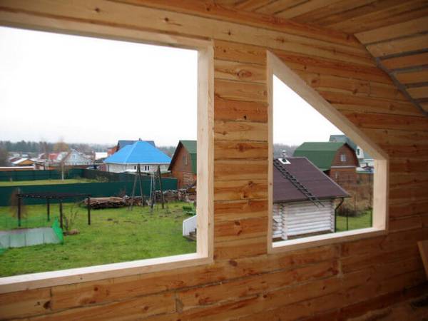 Окосячка окон в деревянном доме - фото
